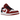 Air Jordan 1 Low Bulls baskets profil. Construction en cuir rouge et blanc avec Swoosh noir, lacets et semelle intermédiaire blanche et rouge.