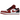 Air Jordan 1 Low Bulls baskets vue latérale. Le design présente des empiècements en cuir blanc, des détails rouges, un Swoosh noir et une semelle rouge.