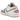 Air Jordan 1 Low Sail College Grey Rattan baskets en vue angulaire avec empeigne en cuir crème, nuances grises et semelle Air classique.