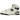 New Balance 650R Aime Leon Dore White Navy baskets vue latérale avec tige en cuir blanc, détails marine, côtés perforés et semelle blanche