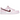 Nike Dunk Low Pink Foam Red White baskets en vue angulaire avec tige en cuir, panneaux roses et rouges ainsi qu'un Swoosh et semelle blancs.