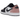Air Jordan 1 Low OG Bleached Coral baskets en vue latérale avec empiècements en cuir blanc, nubuck noir et détails roses au talon.
