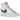 Nike Blazer Mid 77 Vintage White Malachite Green baskets en vue latérale avec empeigne en cuir blanc, Swoosh vert et semelle vintage.