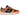 Nike Dunk Low Ceramic baskets vue sous angle avec empeigne noire, swoosh orange, détails verts et une semelle blanche