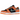 Nike Dunk Low Ceramic baskets en vue latérale avec une tige en daim vert foncé et noir, rehaussée de détails orange vif sur la pointe et le talon.