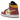 Air Jordan 1 Mid Dia de los Muertos baskets vue sous un angle montrant des détails en cuir blanc, un Swoosh doré et des bordures à motifs vifs.