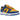 Nike Dunk Low UCLA baskets vue latérale angulaire présentant l'emblématique coloris bleu et jaune doré, avec semelle blanche.