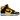 Nike Dunk High Retro Reverse Goldenrod baskets vue latérale avec empeigne jaune, détails en cuir noir, lacets assortis et semelle blanche