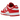 Nike Dunk Low Next Nature St. John's baskets vue angulaire avec base en cuir blanc, empiècements rouges et semelle extérieure blanche.