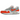 Nike Air Max 1 '86 OG Cosmic Clay baskets en vue angulaire avec empeigne blanche, détails orange et l'unité Air visible emblématique au talon.
