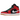 Air Jordan 1 Mid SE Christmas baskets en vue latérale anglée avec des panneaux noirs et verts, détails rouges et semelle blanche
