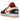 Air Jordan 1 Low Halloween (2023) baskets vue angulaire avec empeigne en cuir noir et orange, lacets assortis et semelle intermédiaire blanche