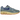 Nike Air Max 1 PRM Dirty Denim baskets en vue angulaire avec tige en denim bleu délavé, semelle extérieure gomme et semelle blanche à bulle d'air.