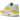 Nike Air Max 1 Tour Yellow baskets vue latérale avec empeigne grise, Swoosh jaune vif, garde-boue en nubuck et unité Air visible dans la semelle.