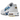 Nike Air Max Plus Spray Paint Swoosh White Blue baskets vue inclinée avec empeigne en mesh blanc, Swoosh bleu façon spray et semelle Tuned Air iconique.