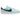 Nike Cortez Textile Glacier Blue baskets vue latérale avec empeigne en textile bleu clair, virgule en cuir blanc et semelle blanche classique