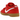 Nike SB Dunk Low University Red Gum baskets en vue angulaire avec tige rouge, logo swoosh blanc et une semelle en gomme marron classique