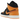 Baskets Air Jordan 1 Mid Fat Tongue Black Orange vue latérale avec languette épaisse, empeigne en cuir noir, détails orange et semelle blanche