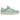 Nike SB Dunk Low Verdy Visty baskets en vue angulaire avec texture en fourrure colorée, empeigne bleu clair, swoosh rose et semelle épaisse blanche