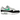 Nike Air Max 1 White Black Stadium Green baskets en vue latérale avec empeigne blanche, détails verts et bulle d'air visible.