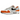 Nike Air Max 1 Monarch baskets vue latérale avec empeigne en mesh blanc, empiècements en cuir orange et marron, et unité Air visible au talon.