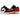 Air Jordan 1 Low Quai 54 baskets vue latérale avec cuir blanc, motifs géométriques détaillés sur le talon et une semelle extérieure rouge.