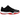 Air Jordan 11 Retro Low Bred baskets en vue inclinée avec empeigne en cuir verni noir, semelle intermédiaire blanche et semelle rouge