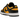 Nike Dunk Low Reverse Goldenrod baskets vue latérale avec empiècements en cuir noir, détails jaunes et semelle intermédiaire blanche.
