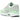 Baskets Nike Air Max 1 Vapor Green en vue angulaire avec tige blanche, détails vert clair et unité Air visible dans la semelle.