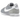 Nike Cortez Textile Flat Silver White baskets en vue angulaire avec tige argentée, logo swoosh blanc et semelle extérieure texturée