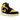 Air Jordan 1 Mid SE New Love baskets vue sous angle, avec ses panneaux en cuir jaune et noir, ses lacets blancs et sa semelle intermédiaire classique.