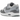 Nike Air Max 1 Dust Wolf Grey baskets vue latérale avec des nuances de gris, une semelle intermédiaire blanche et l'unité Air visible au talon