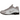 Nike Shox R4 Cave Stone baskets en vue latérale avec ses colonnes d'amorti emblématiques, tige beige et détails noirs sur le talon et logo