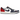 Jordan 1 Retro Low OG Howard University baskets de profil avec une empeigne en cuir blanc, des détails rouges et une semelle contrastée.