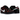 Nike SB Dunk Low Bronx Girls Skate baskets en vue sous angle avec une tige en daim sombre, des lacets noirs et une semelle en gomme