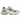 New Balance 9060 White Navy baskets vue latérale angulaire avec tige blanche, détails bleu marine et semelle chunky imposante.