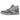 Nike Air Trainer 1 SP Travis Scott Grey Haze baskets de profil avec une tige grise, des lacets bleus et le logo distinctif